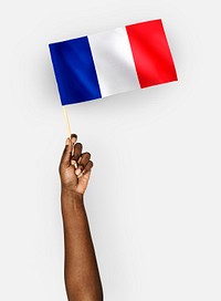 Person waving the flag of French Republic