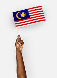 Person waving the flag of Malaysia