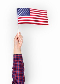 Person waving the flag of the United States of America