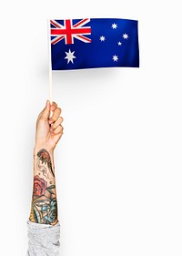 Person waving the flag of Commonwealth of Australia