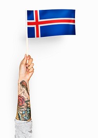 Person waving the flag of Iceland
