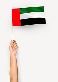 Hand showing flag of United Arab Emirates