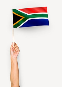 Person waving the flag of Republic of South Africa
