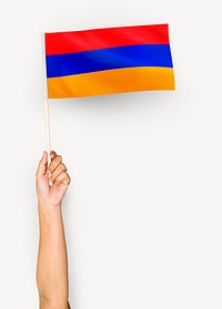 Person waving the flag of Republic of Armenia