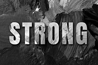 Strong uppercase letters typography on brush stroke background