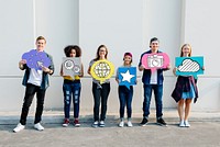 Young diverse friends holding social media icons