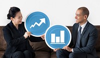 Business people holding graph icons