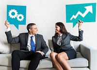 Business people holding speech bubbles with growth icons