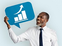 Businessman holding speech bubble with growth icon
