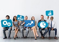 Diverse business people holding icons