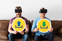Men with VR goggles holding technology signs