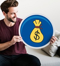 Young man holding a dollar icon