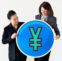 Businesswomen holding a yen icon