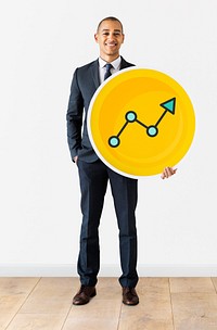 Businessman with growing graph icon