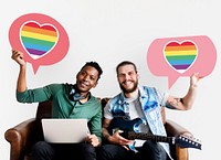 Couple holding speech bubbles with LGBT heart icons