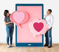 Couple dating online holding heart icons