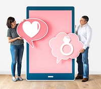 Couple dating online holding heart icons