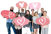 Diverse people holding heart icons