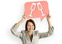Businesswoman holding speech bubble with champagne glasses icon