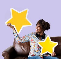 Cheerful woman holding golden stars icons