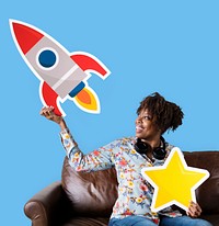 Cheerful woman holding rocket and star icons