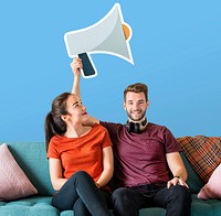 Cheerful couple holding a megaphone icon
