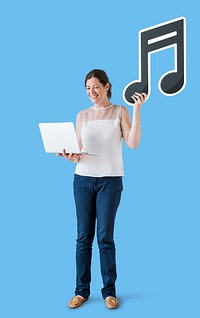 Woman holding a musical note and a laptop<br />