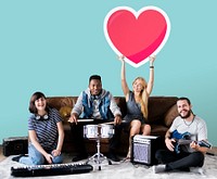 Band of musicians holding a heart emoticon<br />