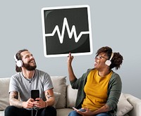 Interracial couple listening to music and holding a frequency icon