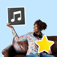 African American woman holding a musical note icon