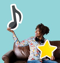 African American woman holding a musical note<br />