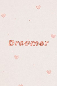Glittery dreamer typography on heart patterned background