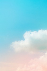 Pastel pink blue gradient sky with clouds background