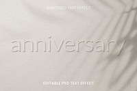 Word embossed editable psd text effect on beige