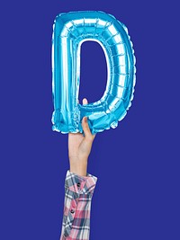 Hand holding balloon letter D