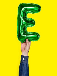 Hand holding balloon letter E