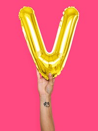 Hand holding balloon letter pink