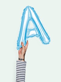 Hand holding balloon letter A