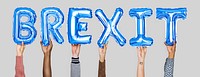Hands holding Brexit word in balloon letters