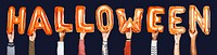 Orange alphabet balloons forming the word halloween