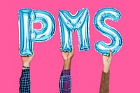 Hands holding PMS word in balloon letters