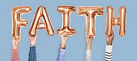 Hands holding faith word in balloon letters