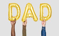 Hands holding dad word in balloon letters