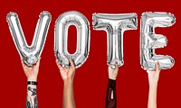 Silver gray alphabet balloons forming the word vote