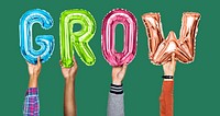 Hands holding balloons spelling Grow