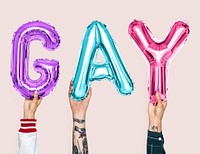 Colorful alphabet balloons forming the word gay