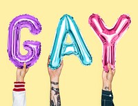Colorful alphabet balloons forming the word gay
