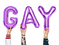 Purple alphabet balloons forming the word gay