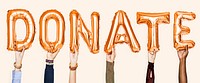 Orange alphabet balloons forming the word donate
