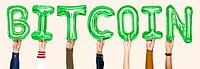 Hands holding balloons spelling Bitcoin